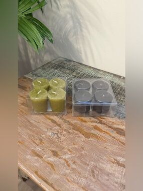 Set of 2, Four packs of votive candles. Green and Black. New in boxes.